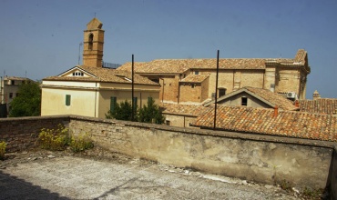 Historic building in the old town with garden and outbuilding