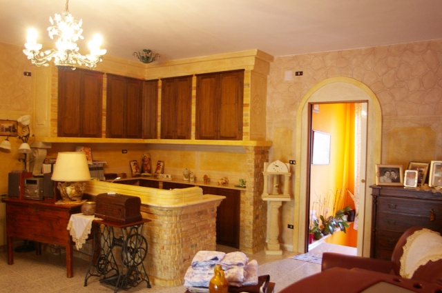 Living room with kitchen of detached house in the countryside near Atri